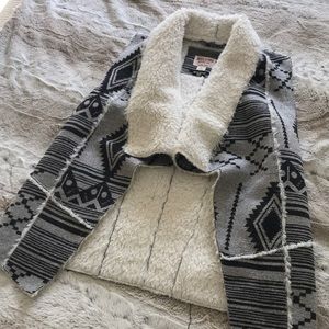 Faux fur lined sweater vest